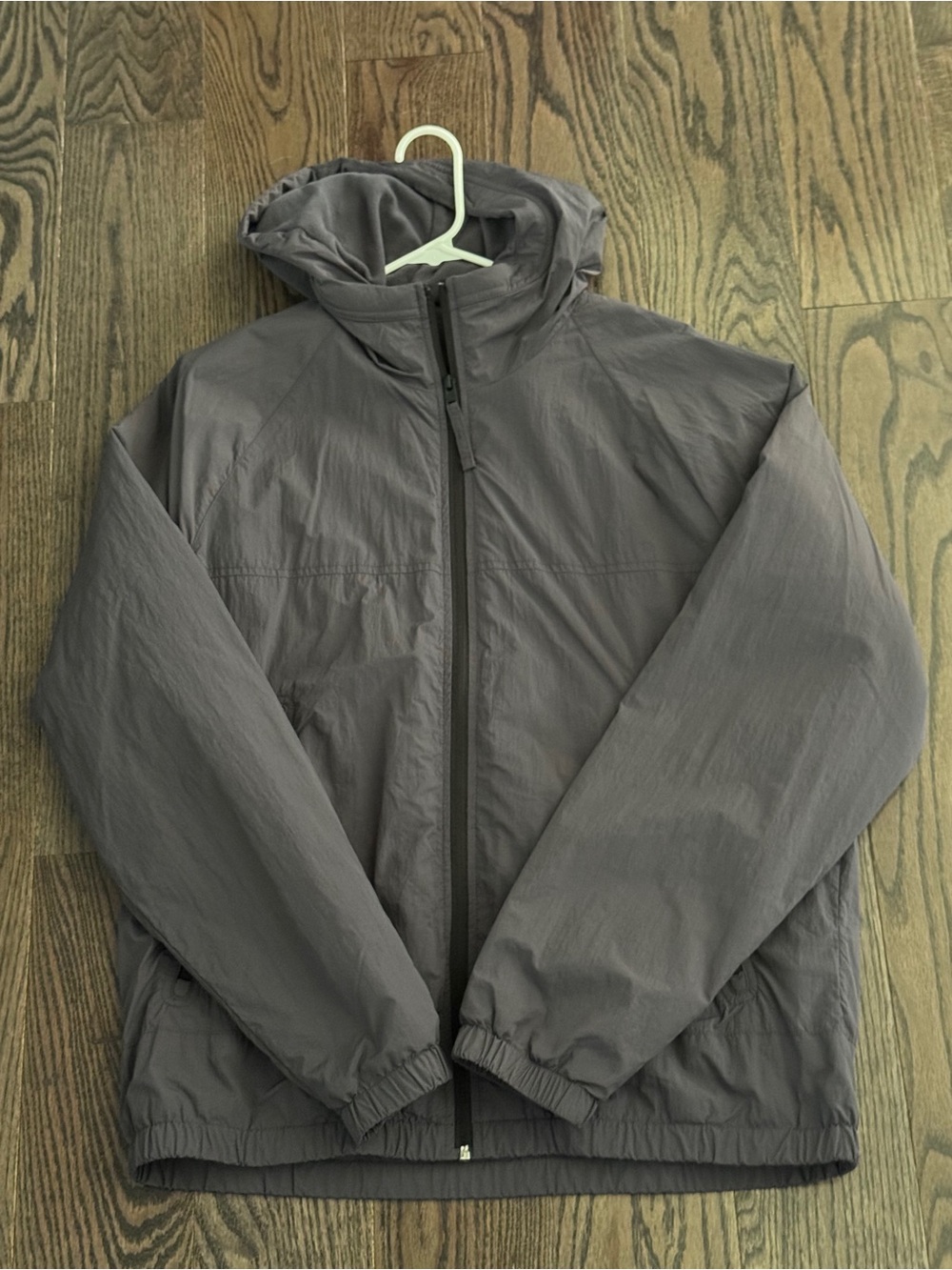 Grey Hollister lightweight windbreaker jacket with hood and zip pockets BRAND NE